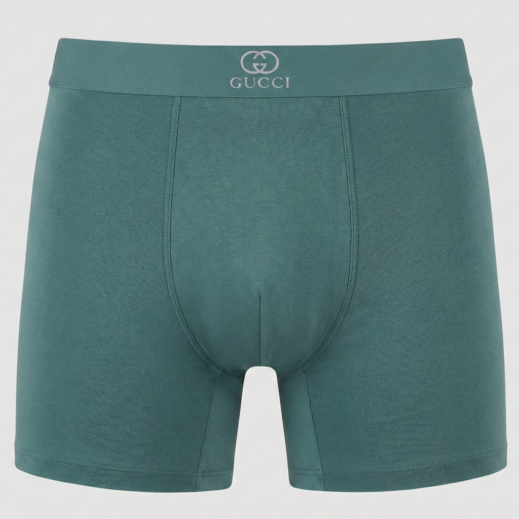 Green Gucci boxer briefs on a white background