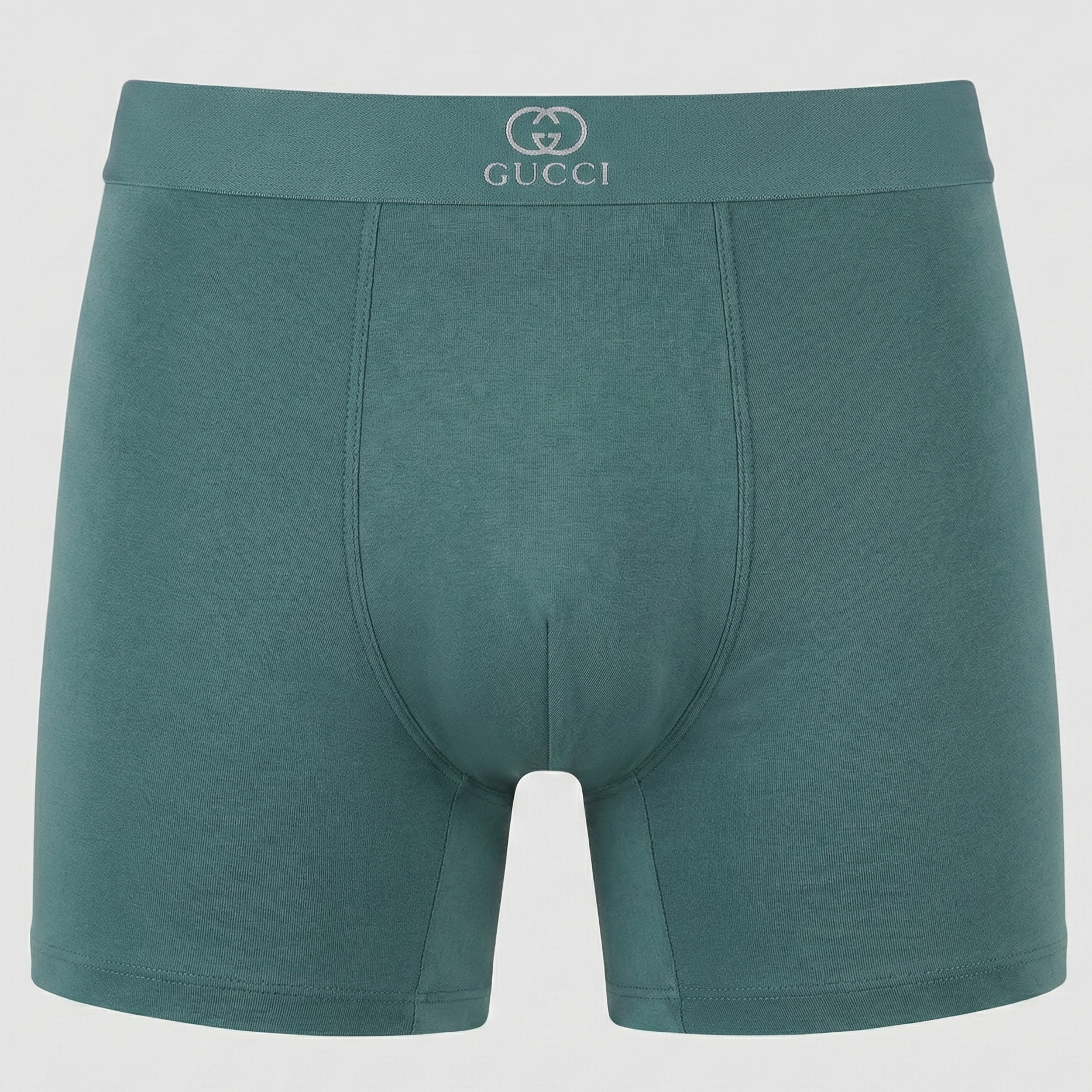 Green Gucci boxer briefs on a white background